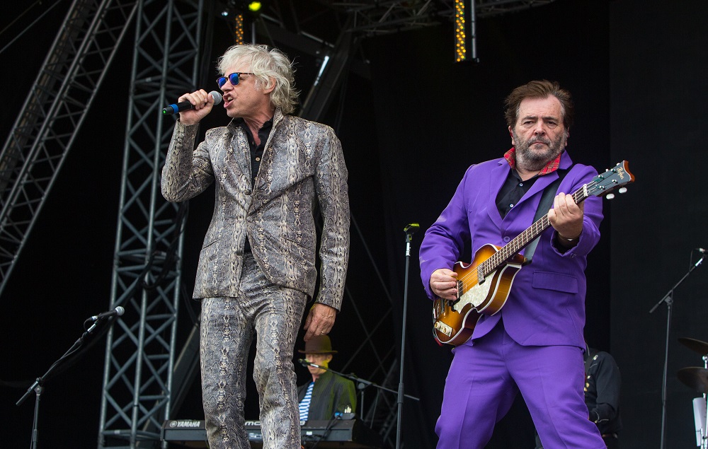 PORTSMOUTH, ENGLAND - AUGUST 27: Bob Geldof and Pete Briquette of The Boomtown Rats perform on day one of Victorious Festival at Southsea Seafront on August 27, 2016 in Portsmouth, England.  (Photo by Lorne Thomson/Redferns)